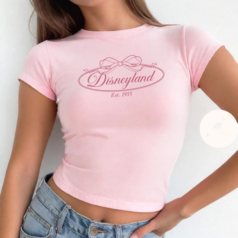 Coquette bow Disneyland Baby tee, Girly Disney Girl Trip Shirt womens T-shirt
